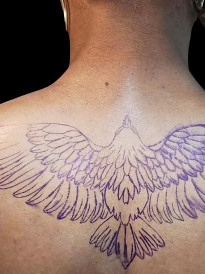 The stencil for the eagle back piece. A precise and clear stencil is the crucial first step for a perfect tattoo.