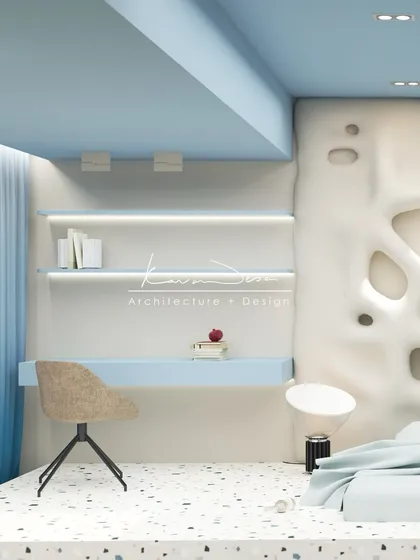 This kids' room blends soft whites and sky blue to create a calming, inspiring space. The focal point is the custom-molded wall with organic, cave-like openings that double as shelves, sparking imagination.