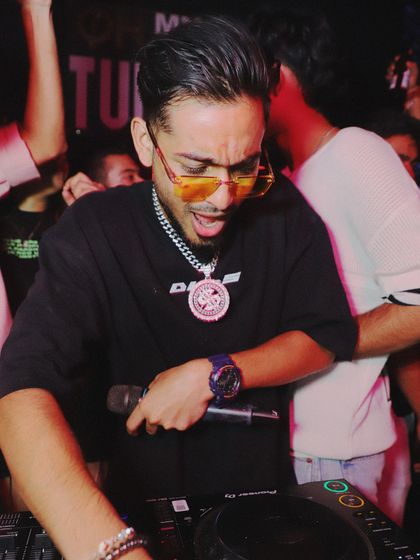 Sharing the deck with my brother DJ SkySync. We often perform as a duo, bringing a unique energy and a fusion of styles to the club scene.