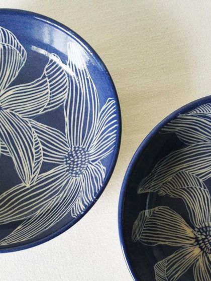 A close-up of the sgraffito technique on the Dutch Iris bowls. Each line is carefully etched through the glaze to reveal the clay, creating a stunning visual texture.