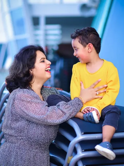 A candid moment of laughter between me and my son. These are the real, unposed moments that truly capture the spirit of a family.