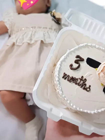 Celebrating a baby's three-month milestone with a custom bento cake. It's a sweet way to capture these fleeting moments.