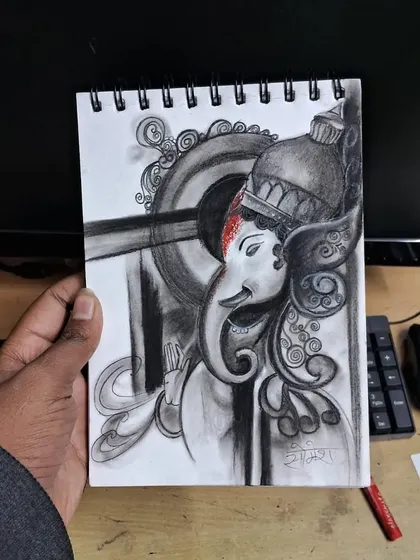 This is one of my charcoal drawings of Ganesh ji. I'm still learning and improving with charcoal, but I wanted to share my progress. It takes a lot of patience to get the shading right, but I am dedicated to getting better with every sketch.