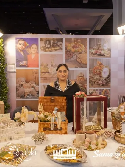 Posing with some of my favorite hampers at the WOW Awards. You can see a variety of styles, from rustic picnic baskets to elegant velvet boxes.