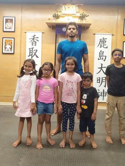 A group photo with some of my students at The Dojo. Each child brings a unique energy to the class, and it's my job to help them channel it productively.