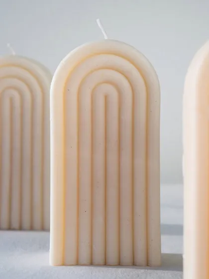 A close-up of our arch or rainbow candle. Its clean lines and simple form are perfect for a minimalist and modern home.