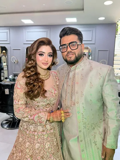 A radiant duo. It's always special to see the happy couple together after we've worked our magic.