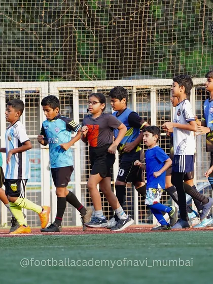Players of various ages run together, showcasing the inclusive and community feel of our academy.