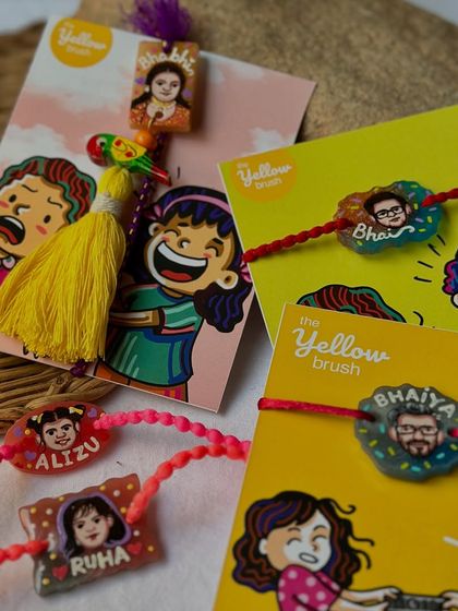 A colorful collection of our various custom Rakhi designs, from portraits to tassels.