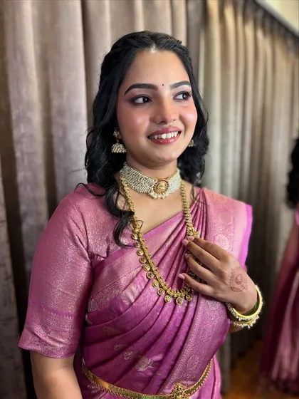 A happy, candid shot of the bride-to-be, her skin glowing.