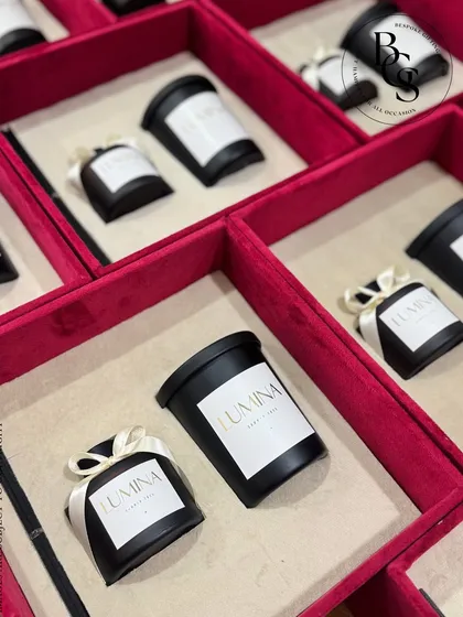 A look inside the custom suede gift boxes for the 'LUMINA' event. These hampers featured artisanal candles and elegant reed diffusers, with every element tailored to align perfectly with the client’s sophisticated vision.