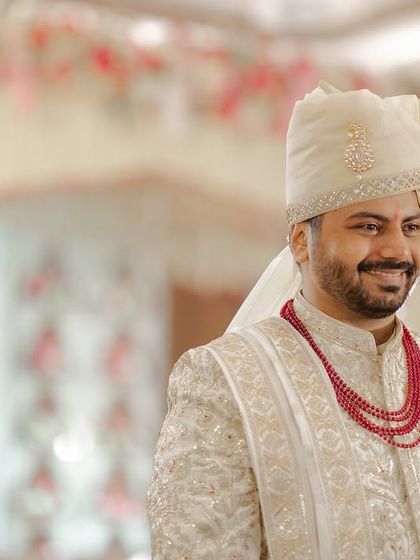 The groom's joyful anticipation as he waits for his bride. We work closely with photographers to ensure these priceless expressions are captured.