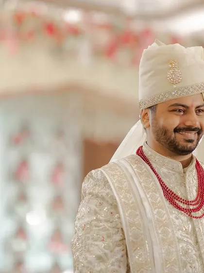 The groom's joyful anticipation as he waits for his bride. We work closely with photographers to ensure these priceless expressions are captured.
