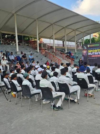 The audience, comprising our young cricketers in their academy whites, is fully engaged during the nutrition workshop. These sessions are designed to be eye-openers, highlighting how every meal plays a role in building a champion.