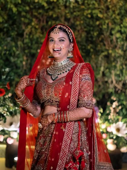 A moment of pure, unscripted laughter from the bride. These are the photos that truly capture the joy of the day.