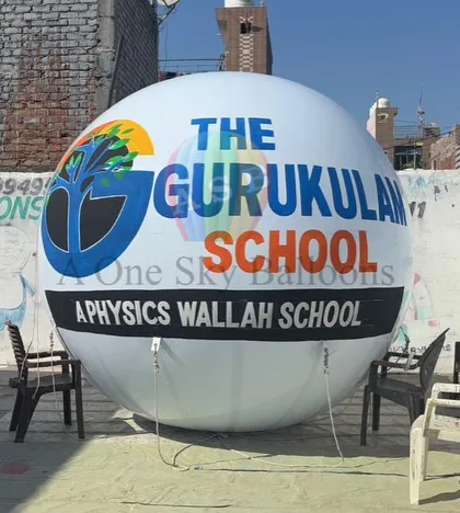 Another angle of the Gurukulan School advertising balloon, showing the quality of the material and the vibrant logo printing.