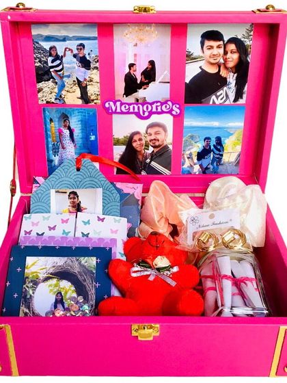 A lovely pink birthday trunk hamper, filled with scrunchies, earrings, a teddy, a message jar, and of course, a collage of 18 photos on the lid.