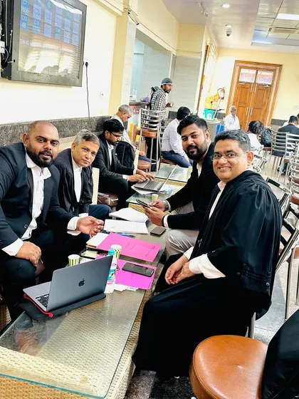 In the midst of case files and discussions with my team. Every detail matters.