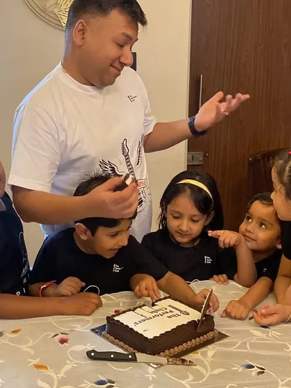 A candid moment of celebration with our young Mumbai students gathered around a cake with me. These get-togethers are all about making learning fun and celebrating the journey together.