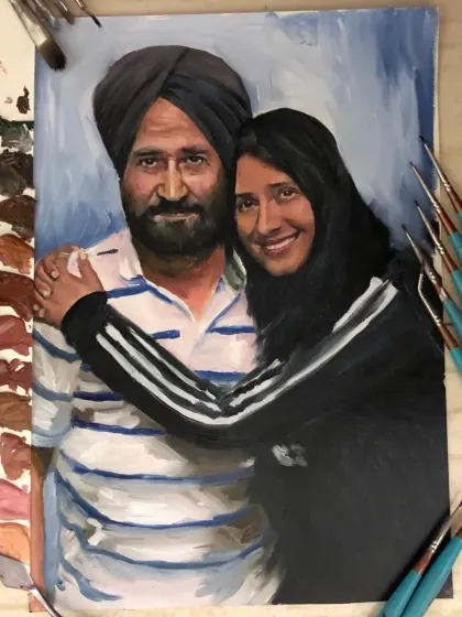 A closer look at the father-daughter oil painting. You can see the brushstrokes and the color palette I used to bring their loving embrace to life.