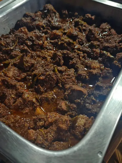 A rich, dark mutton dish prepared for a festive October gathering. The month of festivals is all about colours, flowers, and of course, delicious food.