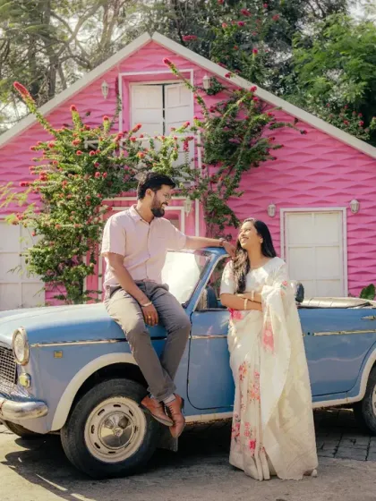 Let's have fun with your pre-wedding shoot. This couple wanted something playful and unique, so we used a vintage car and a quirky pink house as our backdrop for a memorable and colorful photo series.