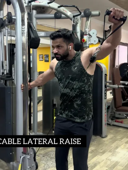 Day 28: Using the cable lateral raise to target the side deltoids for broader shoulders.