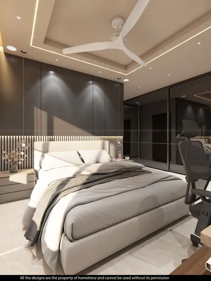 Another angle of the guest bedroom, highlighting the false ceiling with cove lighting and the sleek, modern furniture.
