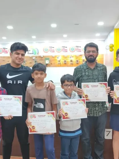 A group of our newly certified shooters after completing their 10m air rifle course. We focus on building a supportive community where students can learn and grow together.