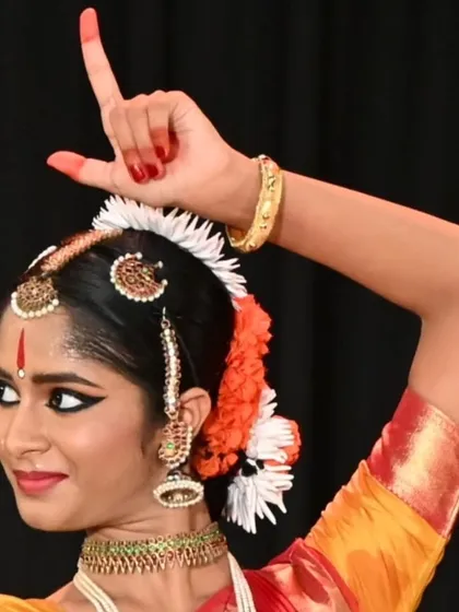 A student's arangetram is a testament to my teaching philosophy. This image of Anvita Jain showcases the precision in form and expression that we cultivate, even for students with no prior background in South Indian culture.