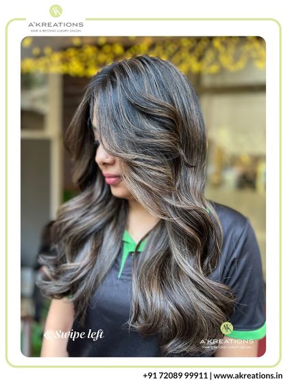 A gorgeous example of cool-toned highlights on dark hair. This look adds a modern, ashy dimension while maintaining a soft and natural feel.