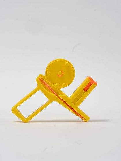 A clean product shot of the assembled Spin Shot disc launcher.