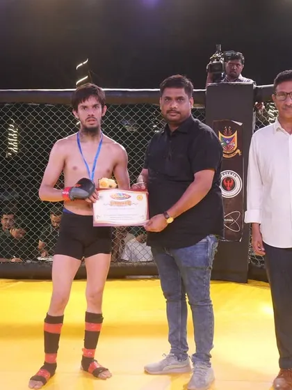 Farhan receiving his medal after a tough fight. Wins and losses are part of the game. What matters is the courage to step in the cage and the hunger to come back stronger.