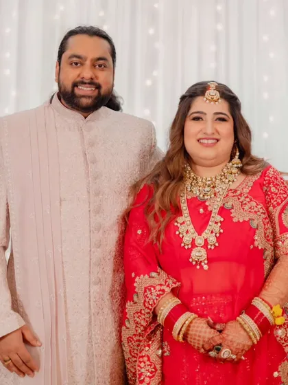 A collection of moments from this bride's reception. Her look was all about soft glam, with flowing waves and makeup that highlighted her joyful smile, creating a perfect look for her evening celebration.