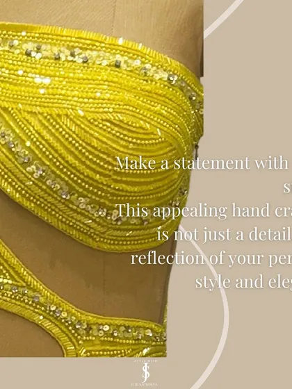 Make a statement with every stitch. This vibrant yellow cutout dress shows how handcrafted details can elevate a look, reflecting your personal style and elegance for a fun pre-wedding event.