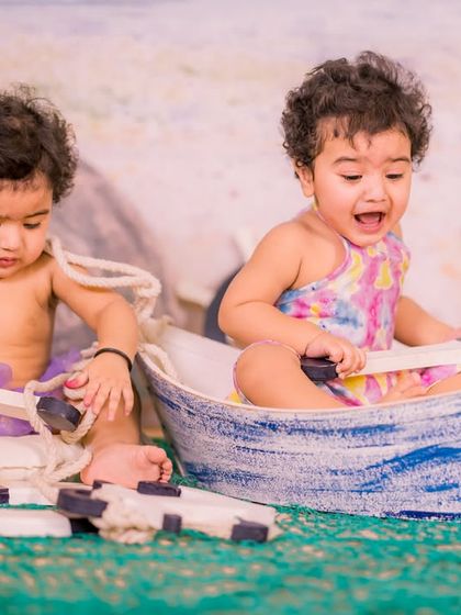 Double the sailors, double the fun. Our nautical boat prop is large enough to comfortably and safely seat two toddlers for an adorable beach-themed twin photoshoot.
