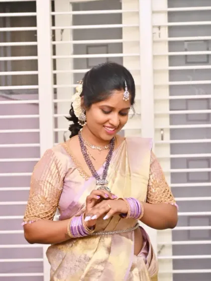 A candid shot of Mithuna. I created a soft, glowing makeup look with a simple hairstyle adorned with flowers.