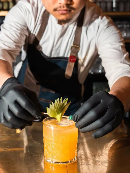 Step into luxury with 'Mansion', our exquisite vodka-based creation. Our mixologist adds the final touch to this refreshing summer cocktail, crafted to perfection for a glamorous escape.