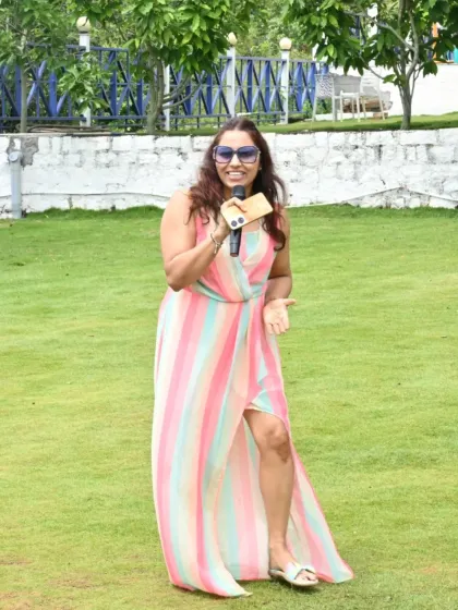 Another angle of me hosting an outdoor event. The open space allows me to freely interact with guests and create a dynamic experience.