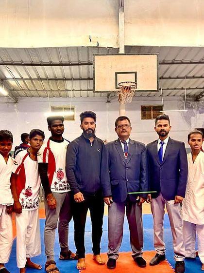 With fellow officials and competitors at the championship. Being part of the larger karate community in India is a privilege.