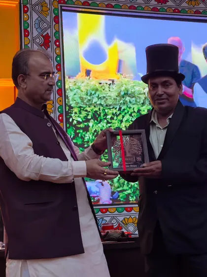 A full-stage view of the moment I received the award from the Health Minister. It was a proud moment for me, shared with a wonderful audience.