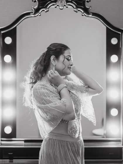 A beautiful black-and-white version of the getting-ready shot, highlighting the texture and light.