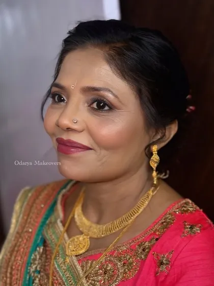 A beautiful mature skin makeup look for the bride's mother. The focus is on creating a soft, radiant glow and defining her eyes.