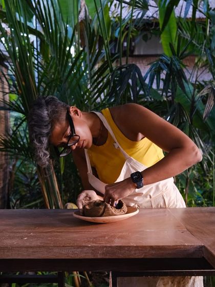 A photo from my time in Bali, where I had the privilege of learning from talented artists from around the world. This is me, carving a Kurinuki piece in a beautiful outdoor studio.