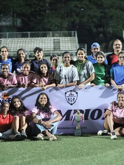 Another angle of our team and supporters celebrating the WIFA championship, showcasing the strong community behind our club.
