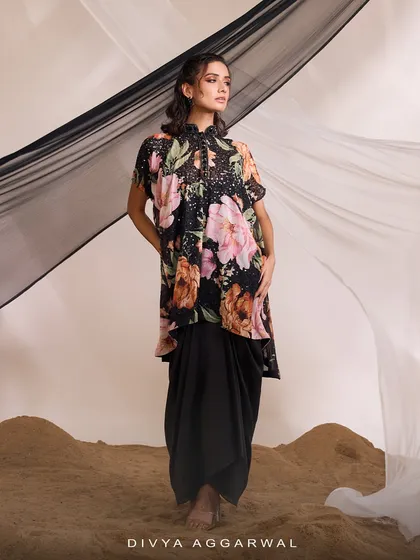 A side view of the LIANA Kurti Set, showing the asymmetrical hem of the floral kurti and the solid drape skirt.