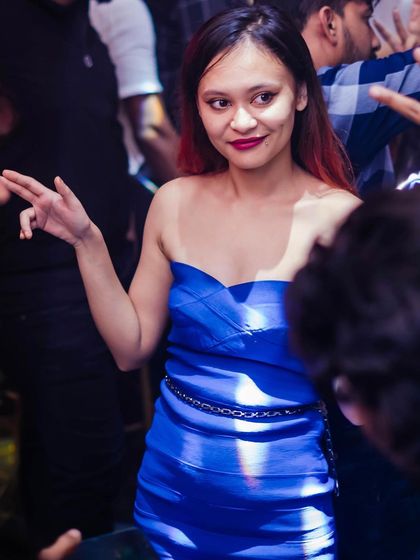 A guest dancing in the crowd.