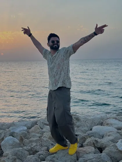 A joyful, celebratory pose by the sea. This is the energy I feel when I love my job.