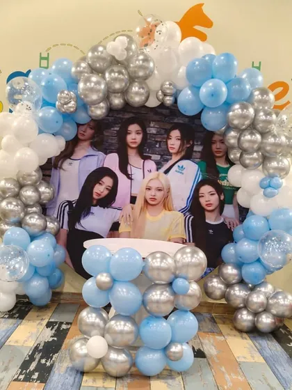 A unique K-Pop themed birthday setup. We can cater to any interest, including creating a stylish backdrop featuring your child's favorite band.