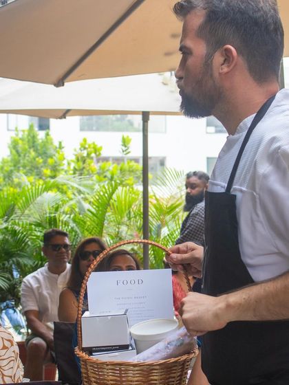 Sharing my passion for food and wine with guests during our picnic event.